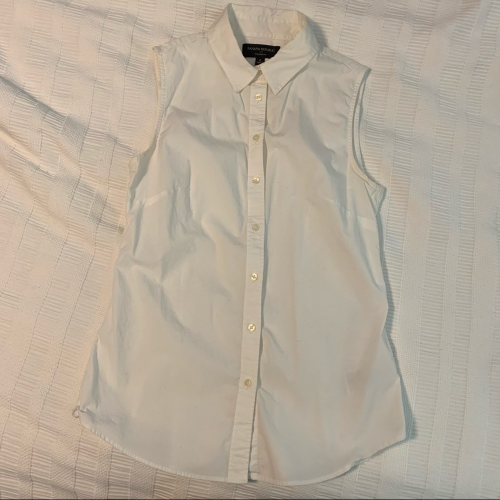 Sleeveless button front collared shirt